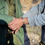 شکارچیان غیر مجاز کل های وحشی در رامسر دستگیر شدند